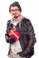 Warmly Dressed Handsome Young Adult Holding Gift