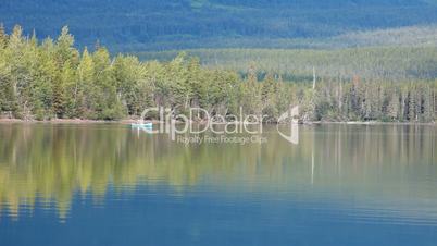 Canoe on mountain forest lake P HD 0166