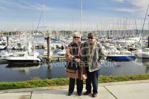 Senior couple at yacht harbor