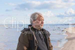 Middle-aged man at the sea.