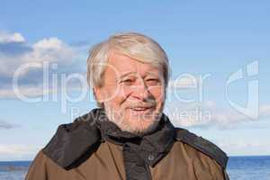 Portrait of middle-aged man at the sea.
