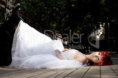 Pretty woman posing in forest