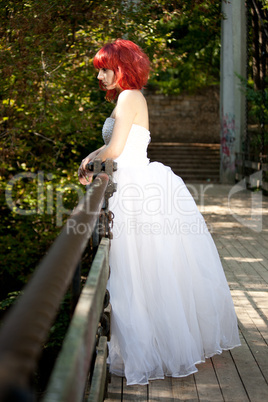 Pretty woman posing in forest