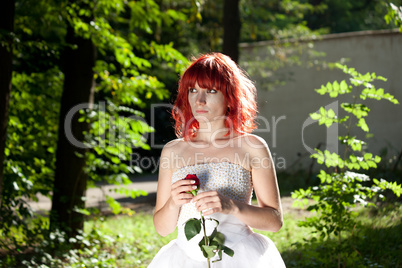 Pretty woman posing in forest