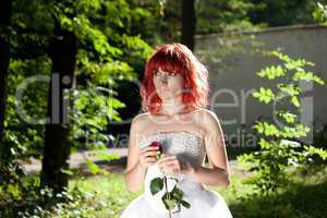 Pretty woman posing in forest