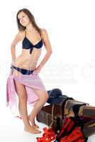 Girl in swimming suit with suitcase