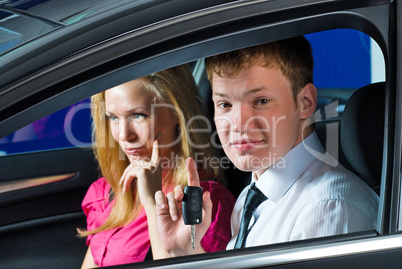 Young couple in car