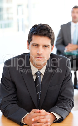 Concentrated businessman during a meeting with a colleague