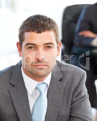 Serious businessman during a meeting with a colleague