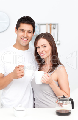 Portrait of a couple drinking coffee during breakfast