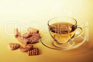 Cup of hot tea with cookies