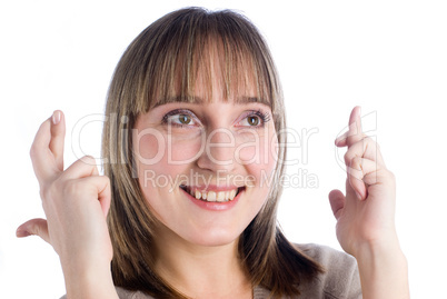 Girl with crossed fingers