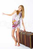 Young woman with suitcase