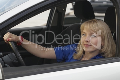Smiling woman on drive