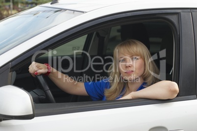 Young woman in car