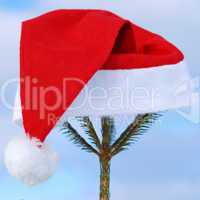 Traditional Santa hat on winter background