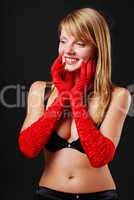 Charming blonde in the red gloves