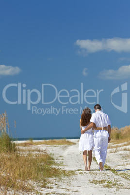 Couple Walking on An Empty Beach