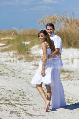 Romantic Man and Woman Couple Walking on An Empty Beach