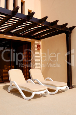 Sunbeds at villa in luxurious hotel, Dubai, UAE