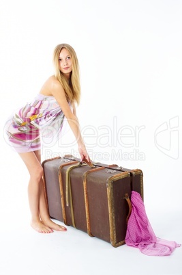 Young woman with suitcase