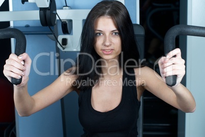 Young woman in sport club