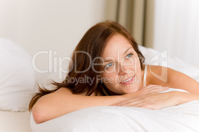 Bedroom - happy woman in white bed