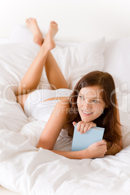 Bedroom - young woman with book