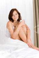 Bedroom - young woman drink coffee
