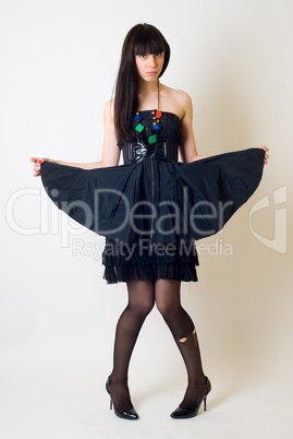 Young woman in torn stockings Young woman in torn stockings