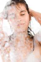 Young woman enjoy shower