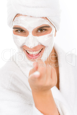 Teenager facial mask - happy woman