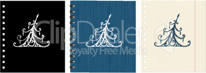 Sketch of christmas pine ornament on notebook cover and sheet