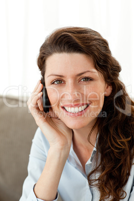 Portrait of a pretty businesswoman talking on the phone