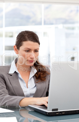 Pretty woman working on the computer