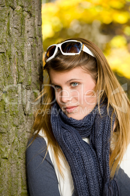 Autumn park - fashion woman with sunglasses