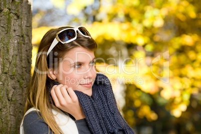 Autumn park - fashion woman with sunglasses