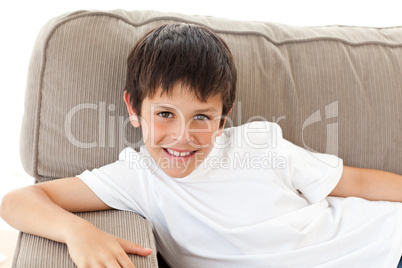 Portrait of an adorable child relaxing on the sofa