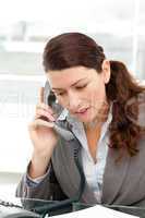 Concentrate businesswoman talking on the phone