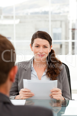 Charismatic businesswoman during an interview with a businessman