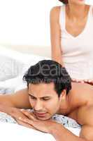 Close up of a woman doing a massage to her boyfriend