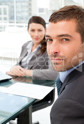 Charismatic businessman during a meeting with his colleague