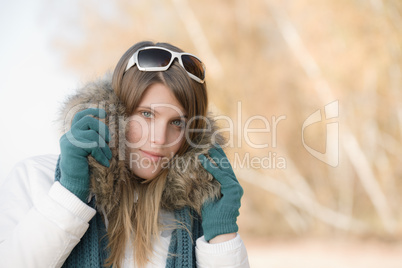 Winter fashion - woman with fur hood