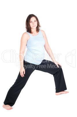 Portrait of pretty pregnant woman practicing yoga