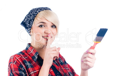 Young woman with paintbrush