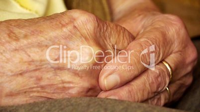 Senior old woman young man hold hand wrinkle skin close up