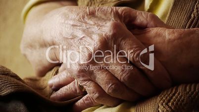 Senior old woman young man hold hand wrinkle skin close up