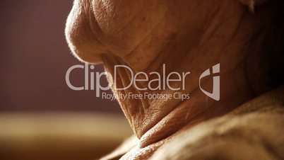 Senior old woman throat neck wrinkle skin close up