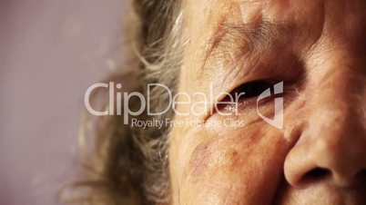 Senior old woman face eye wrinkle skin close up HD