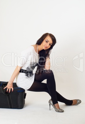 Beautiful girl with suitcase